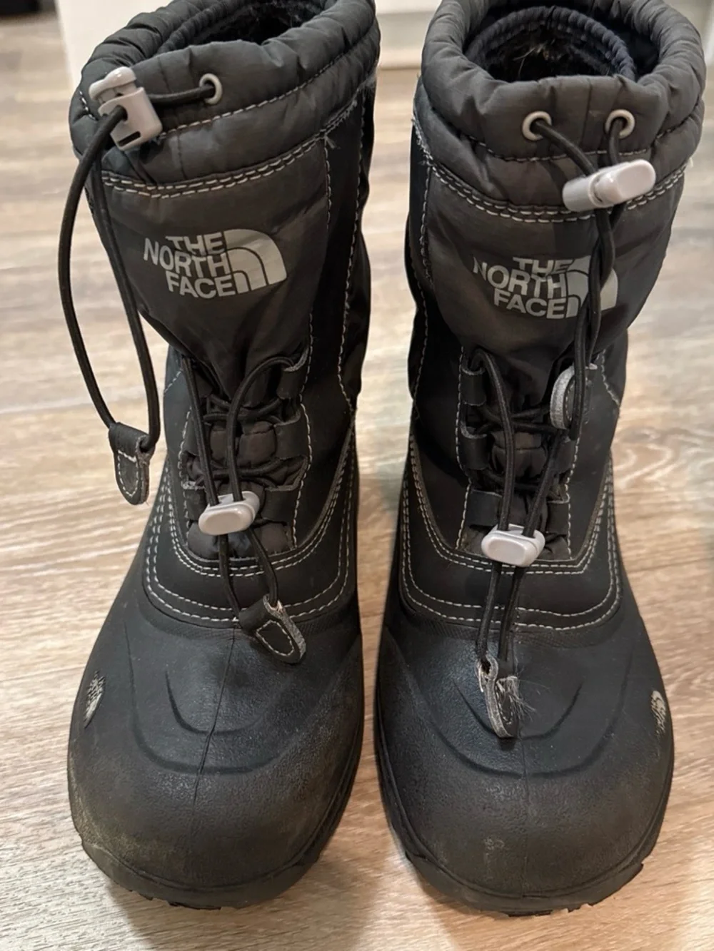 The North Face Kids Black Insulated Snow Boots with Bungee Closure